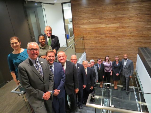ISBA Board members check out the new staircase leading from the ISBA Offices to the new ISBA Mutual space. From lower right: President-elect Vincent Cornelius