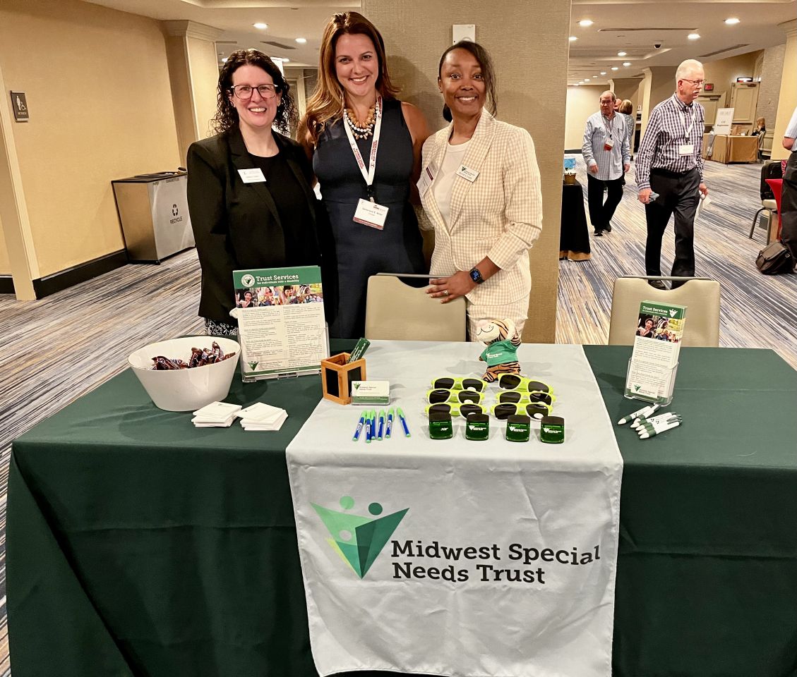 ISBA 3rd VP Sarah Toney and YLD member Genevieve Miller learn about Midwest Special Needs Trust