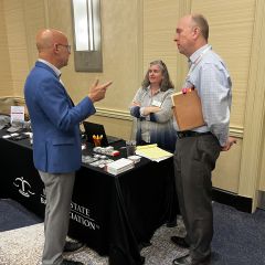 ISBA Past President Shawn Kasserman visits the ISBA Member Services booth