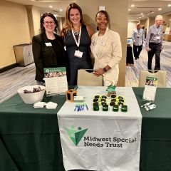 ISBA 3rd VP Sarah Toney and YLD member Genevieve Miller learn about Midwest Special Needs Trust